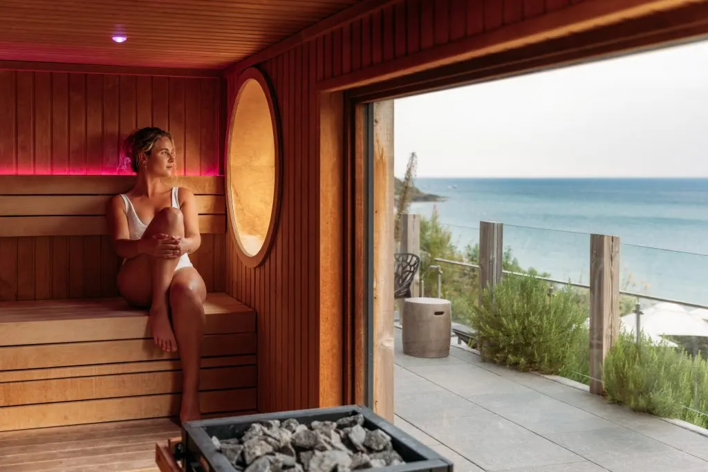A guest overlooking the Cornish coast from the Carbis Bay spa.